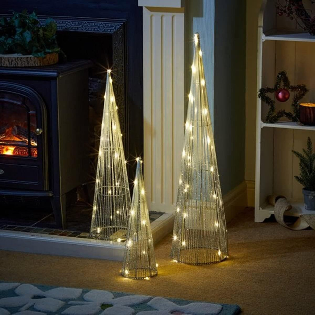 3 lighted gold christmas cone trees
