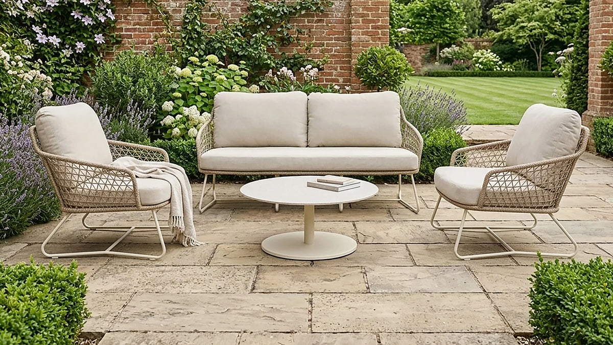 Wooden and metal pergola in a garden with garden furniture