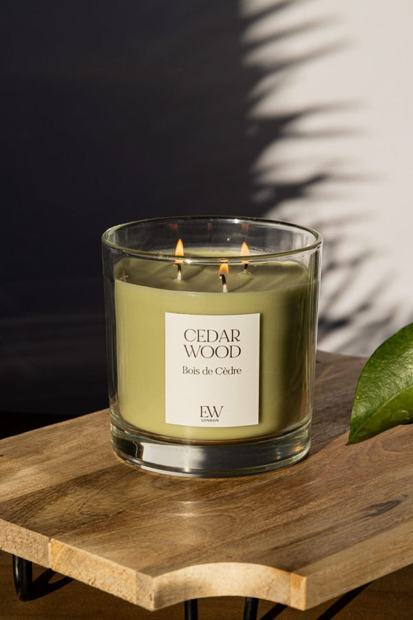 Large three wick candle with rich woody fragrance
