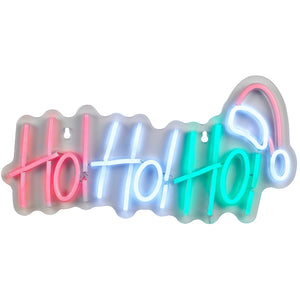 A neon sign spelling out 'Holly Holly' in pink, white, and teal colors, with a pink Santa hat at the top right, set against a plain white background.