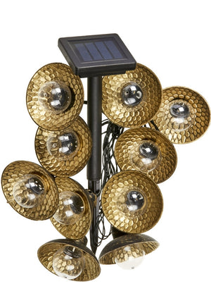 Ten solar lantern lights glowing in an outdoor garden
