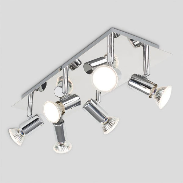 Modern ceiling light fixture with multiple adjustable lights on a gray background