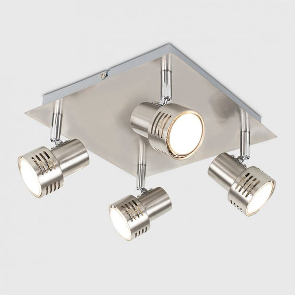 Ceiling light fixture with four spotlights on a white background