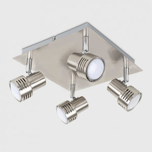 Ceiling light fixture with four spotlights on a white background