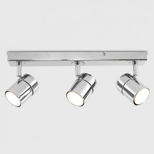 Chrome ceiling light fixture with three spotlights on a white background
