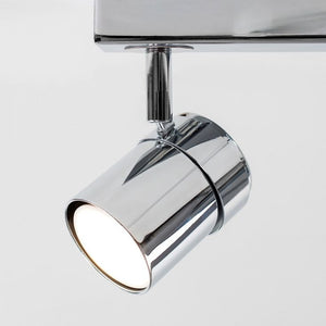 Chrome ceiling light fixture on a white background