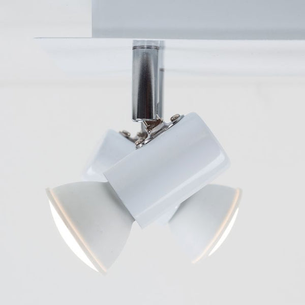 White ceiling light fixture with chrome finish on a white background