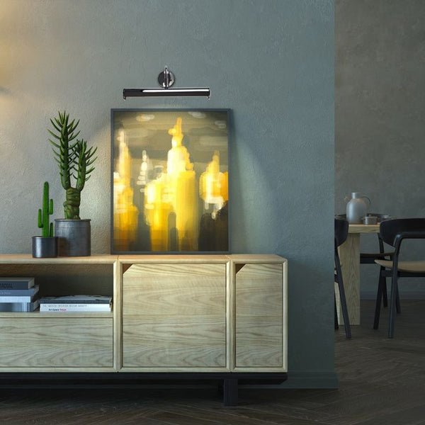 Modern interior with wooden cabinet, decorative items, and a painting on a gray wall.