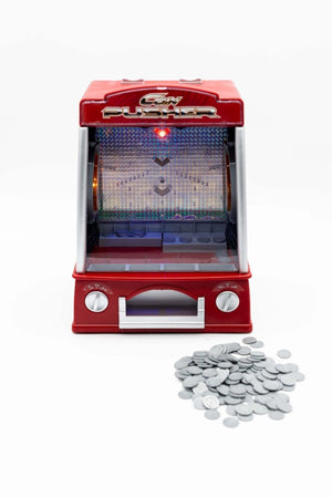Red coin pusher arcade game with coins on a white background