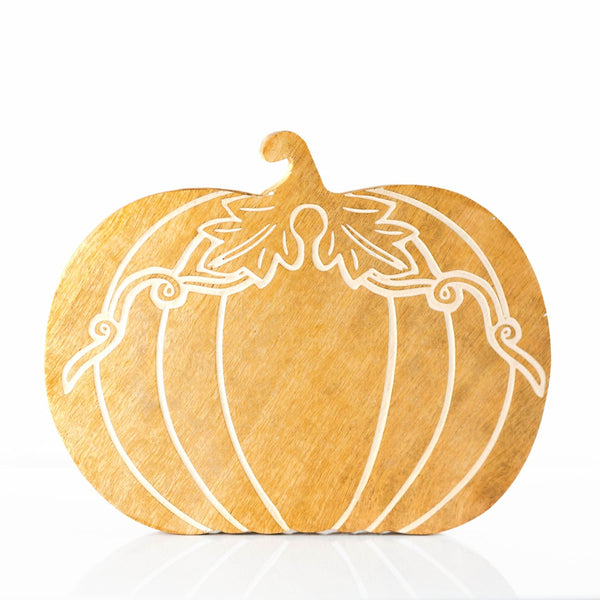 Decorative pumpkin-shaped cutting board with white lines on a white background