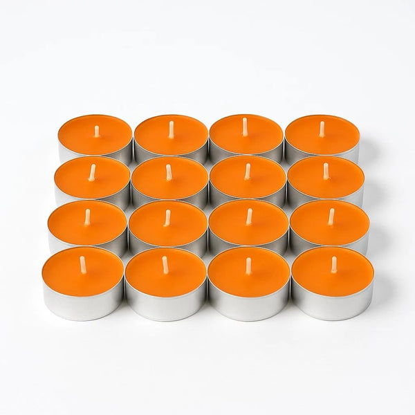 Spiced orange tealights arranged for autumn home fragrance