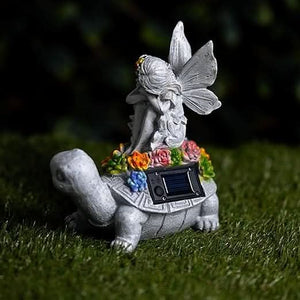 Solar tortoise statue with fairy detail