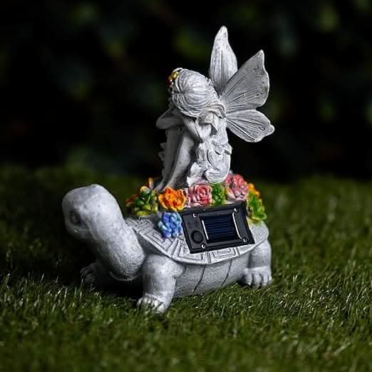 Solar tortoise statue with fairy detail