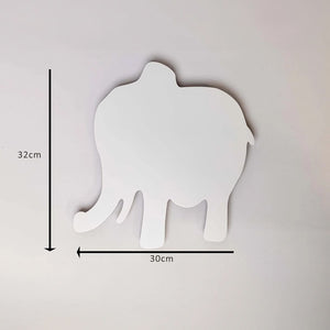 White elephant-shaped object with measurements on a light gray background