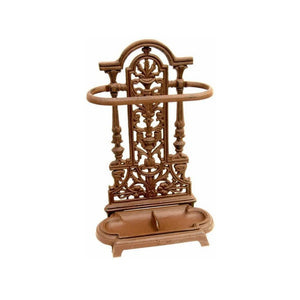 Antique style brown ornate vintage umbrella stick stand made of cast iron.