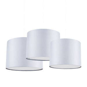 Three white cylindrical lampshades on a white background