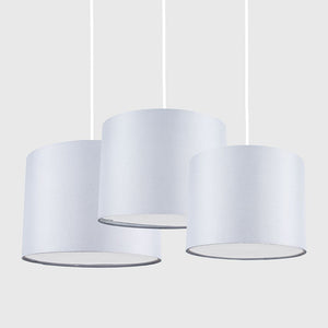 Three white pendant lights on a white background