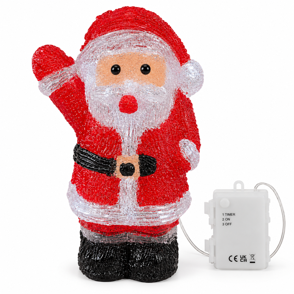 inlit santa decoration in a snowy wintery scene