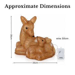 A textured brown deer figurine with a small white power pack and wire, shown with dimension lines and text reading 'Approximate Dimensions' on a white background.