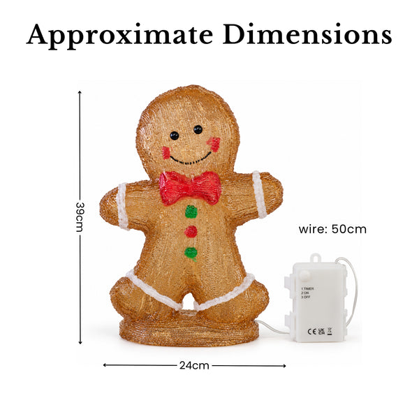 A gingerbread man Christmas decoration with approximate dimensions shown on a white background, including a height of 38 cm, width of 24 cm, and wire length of 50 cm.