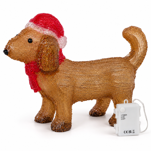 acrylic dachshund wearing a red Santa hat and scarf on white background
