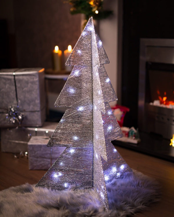 Silver lighted metal christmas tree