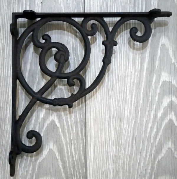 Two decorative shelf supports with vintage finish