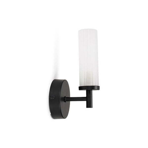 Black wall sconce with a white candle-style light on a white background
