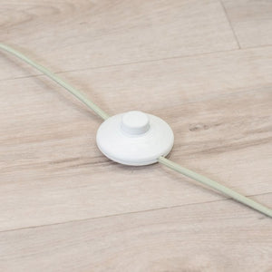 White cable tie on a wooden floor