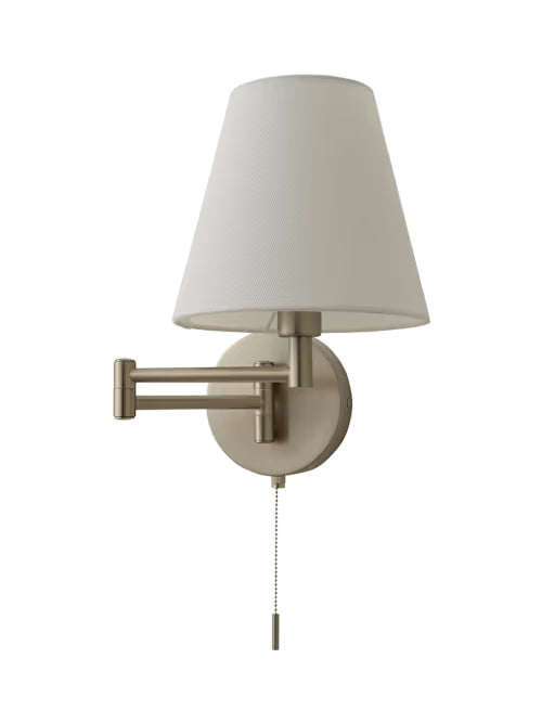 Wall-mounted lamp with a white shade on a white background