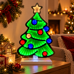 40cm Christmas tree infinity light glowing on a festive living room table.