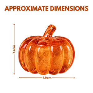 An orange pumpkin-shaped decorative object with approximate dimensions shown on a white background, with text reading 'APPROXIMATE DIMENSIONS' and measurements of 7.9 cm wide by 7.