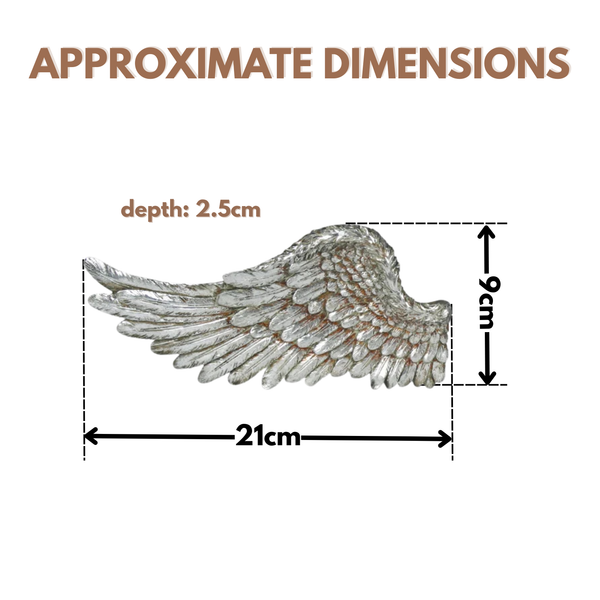 Approximate dimensions diagram of a decorative wing ornament on a white background, with text showing depth 2.5cm, width 21cm, and height 9cm.