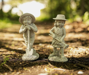 Boy and girl gardening statues with stone effect finish