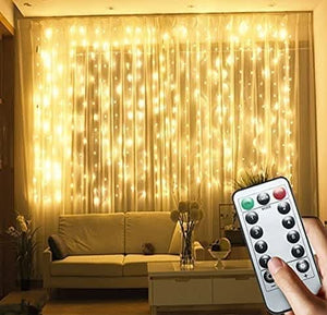 300 LED warm white curtain string lights 3 x 3m