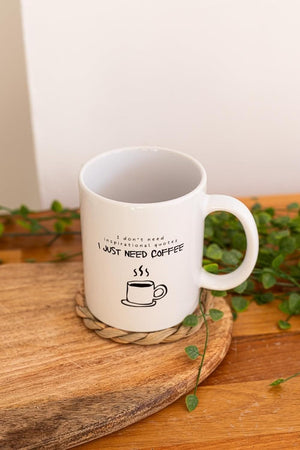 Four motivational mugs displayed together