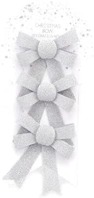 Silver decorative bow on a white background with snowflake decorations