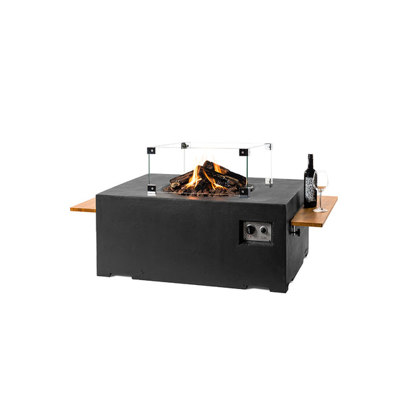 Modern outdoor fire pit table with glass barrier and bottle on a white background