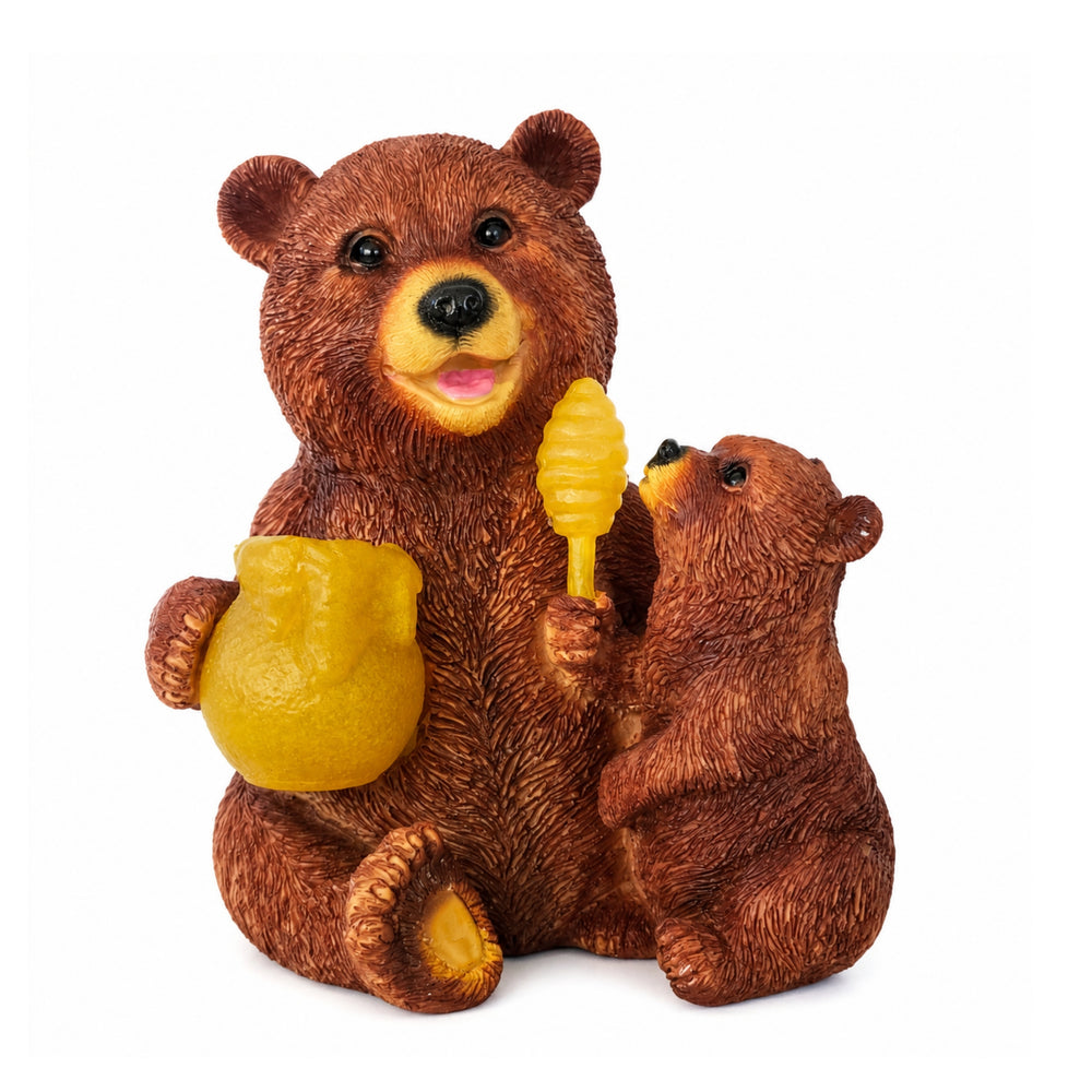 Two bear figurines holding glowing orbs in a garden setting with flowers and a lantern.