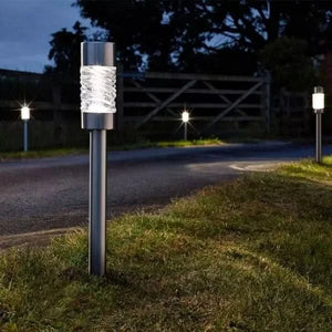 Three 57cm solar garden stake lights with glass