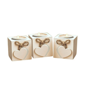 Rustic heart candle holders displayed together
