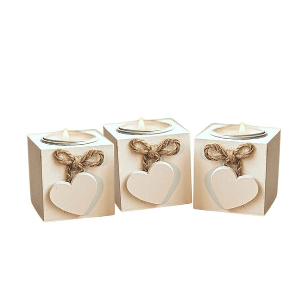 Rustic heart candle holders displayed together