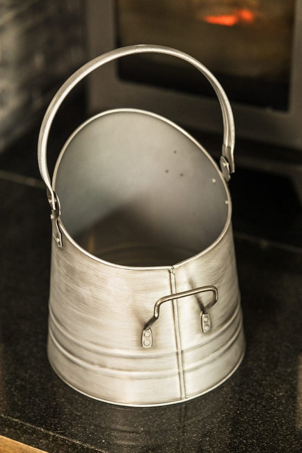 Silver coal bucket with matching fireside shovel