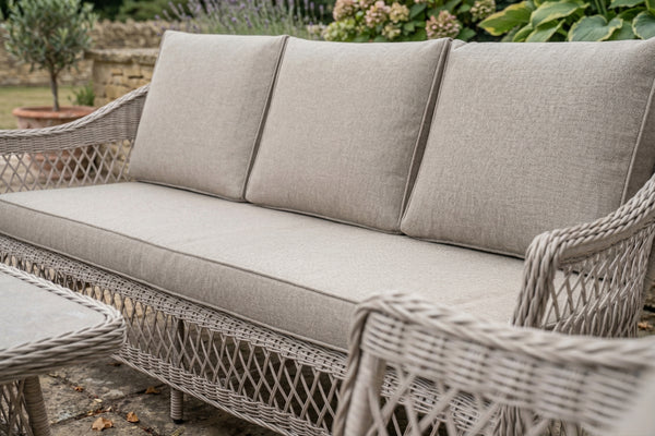 Outdoor wicker sofa with stools