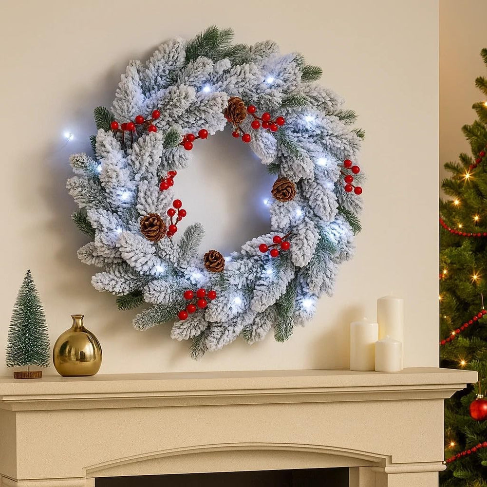Snow flocked Christmas wreath with LED lights.