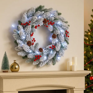 Snow flocked Christmas wreath with LED lights.
