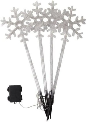 Set of snowflake-shaped light sticks with a black base on a white background