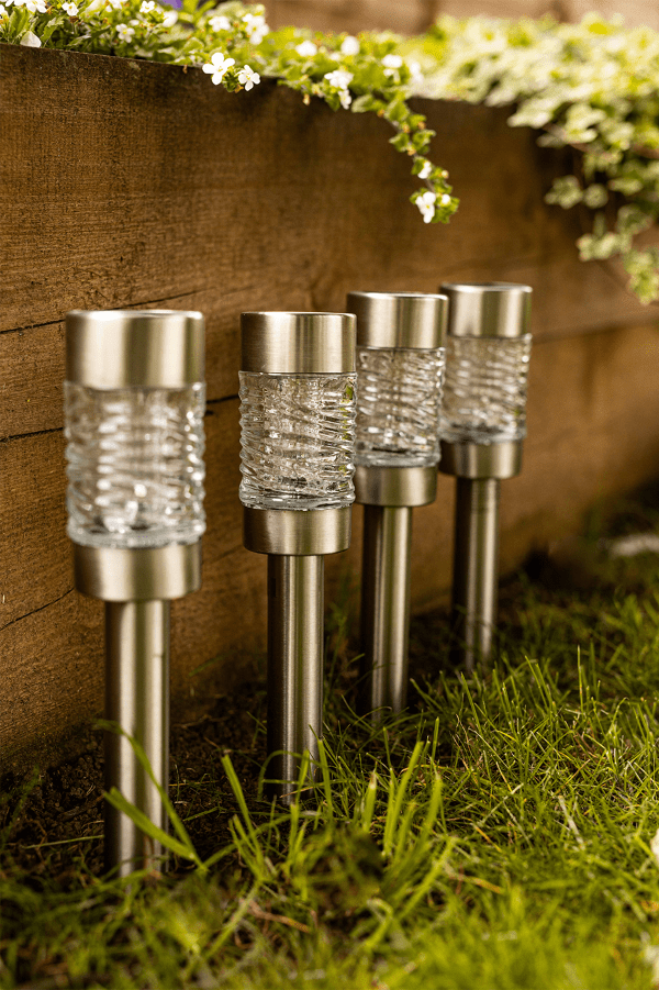 Faceted glass solar lights illuminated after dark