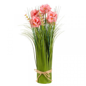 Bouquet of pink flowers with green stems tied with twine on a white background
