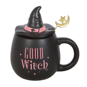 Black mug with witch hat lid and 'Good Witch' text on a white background